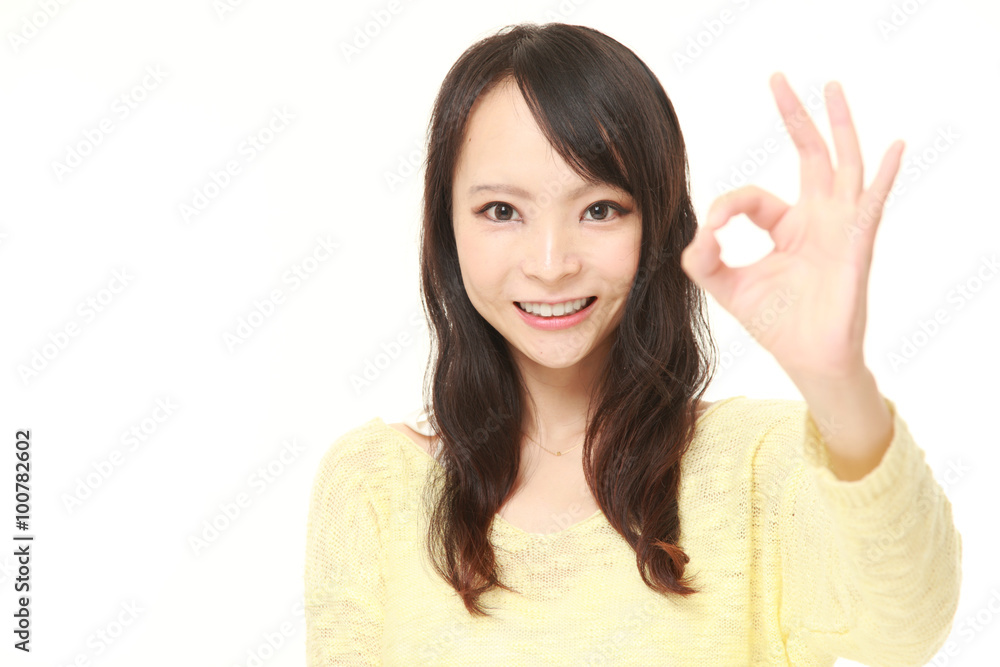 Japanese woman showing perfect sign