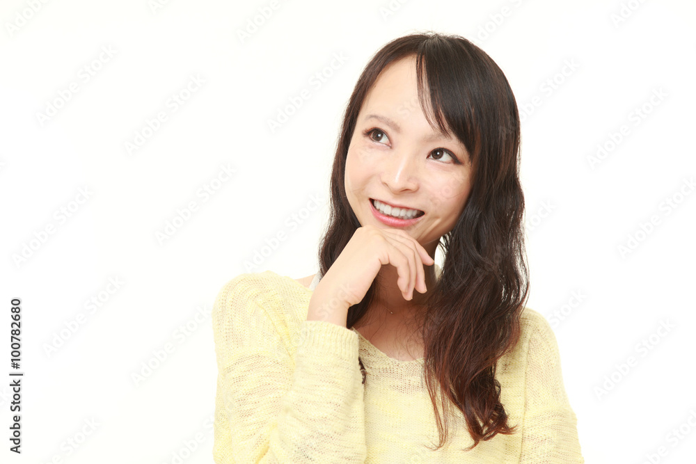 young Japanese woman dreaming at her future young Japanese woman dreaming at her future