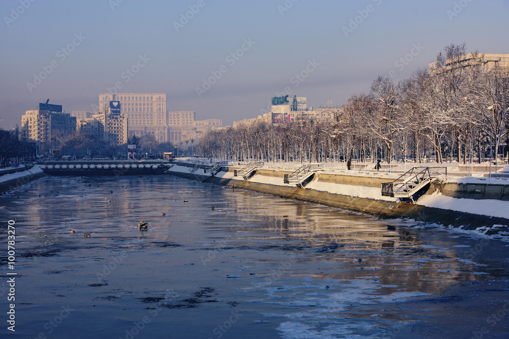 Bucharest, Romania – January 20, 2016: The Parliament Palace(People’s Palace) and Dimbovita River, during winter season.