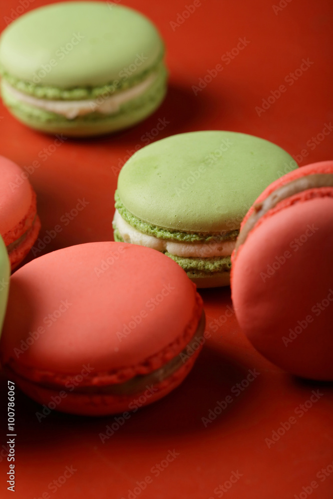macaroons close-up on red background macaroons close-up on red background