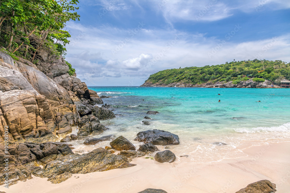 Fototapeta premium Turquoise waves on the island of Ko Racha Yai. Thai Phuket Province