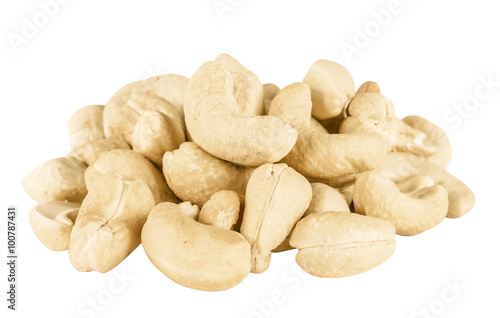 Heap of peeled cashew isolated on white background