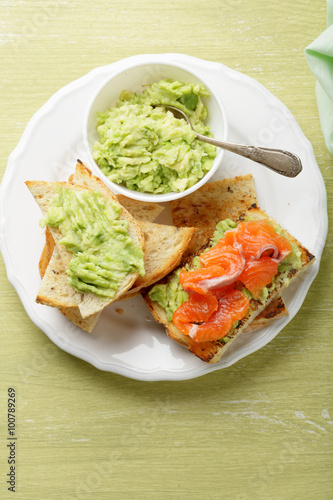 toasts with avicado cream and trout photo