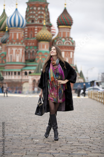 Young woman in a mink coat on the Red Square in Moscow © Andrey_Arkusha