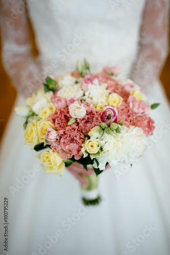 the bride holding a bouquet