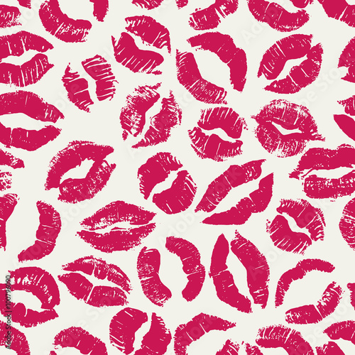 Seamless pattern with lipstick kisses.
