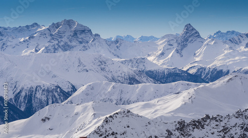 Mountains in the Parsenn area, ski resort Weissfluhgipfel in Davos, Switzerland photo