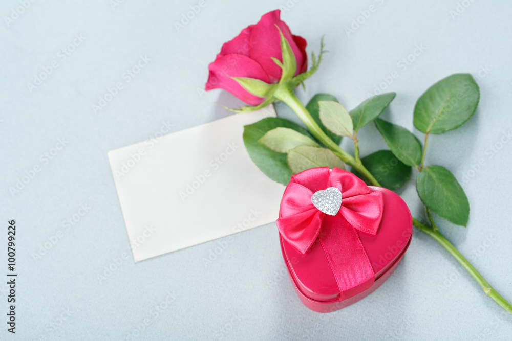 Blank greeting card, gift and rose Blank greeting card, gift and rose