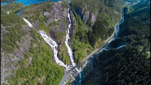 Aerial footage Latefossen Waterfall Odda Norway. Latefoss is a powerful, twin waterfall. View from the bird's-eye view. photo