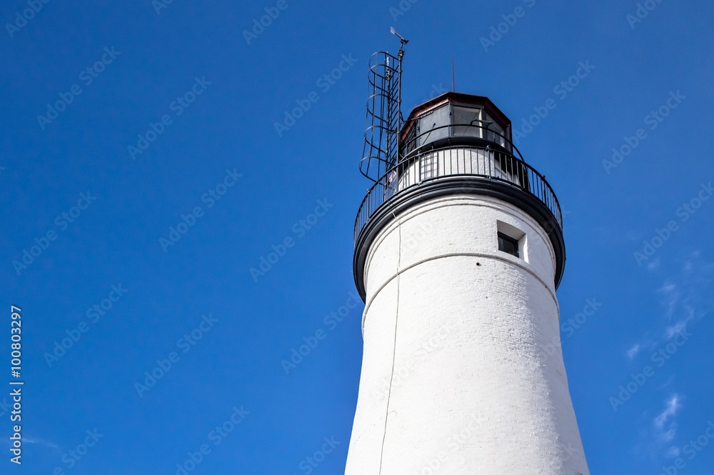 Fort Gratiot Lighthouse Tower. The Fort Gratiot Light is the oldest lighthouse in Michigan. Shot in horizontal orientation with copy space.