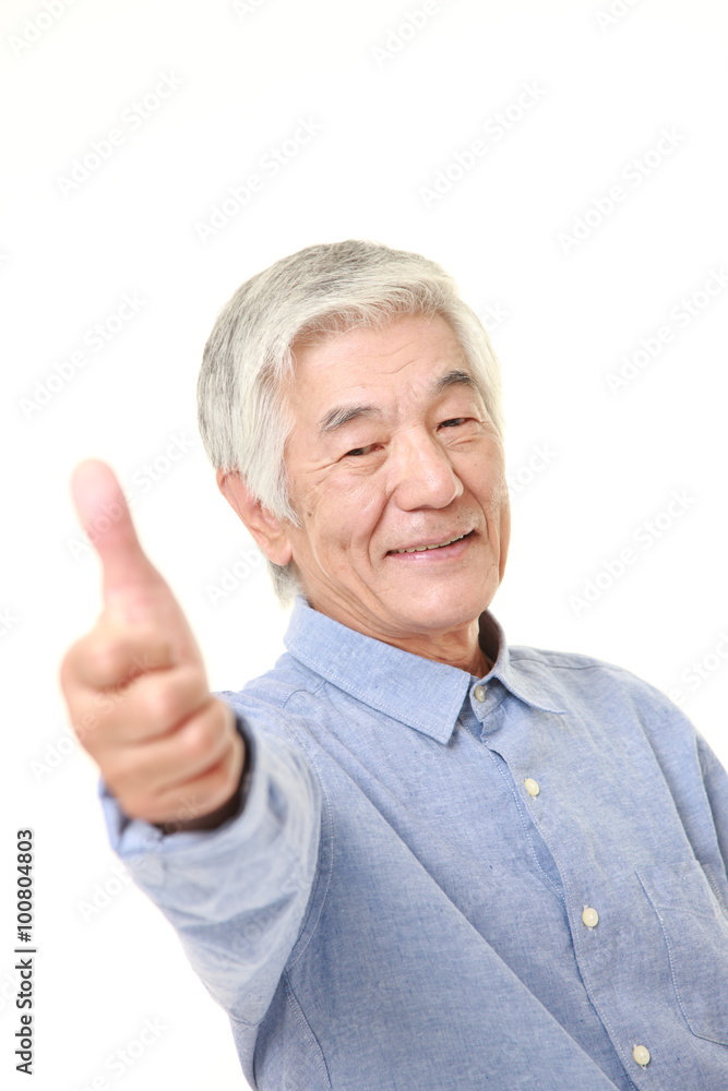 senior Japanese man with thumbs up gesture senior Japanese man with thumbs up gesture