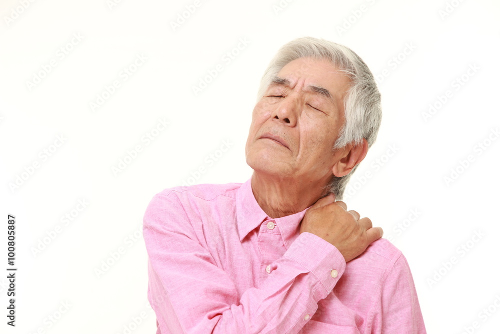 senior Japanese man suffers from neck ache senior Japanese man suffers from neck ache