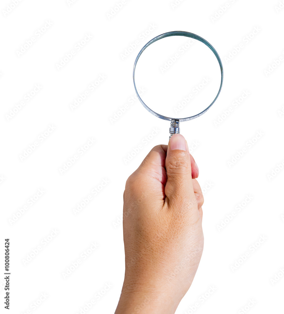 Man's hand holding magnifying glass Man's hand holding magnifying glass