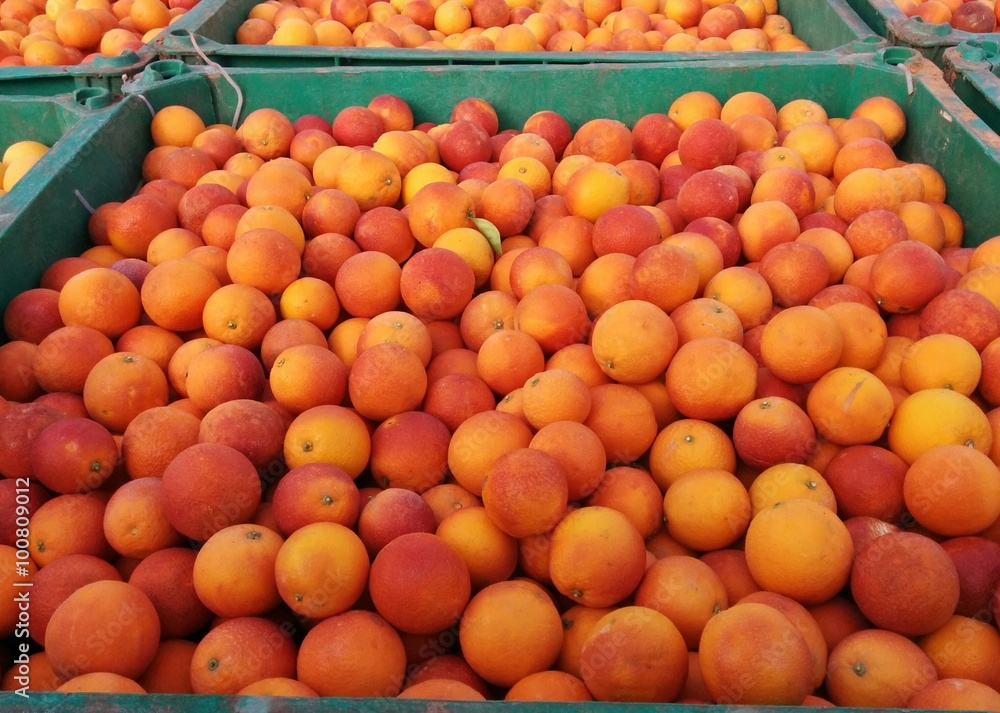 Fresh oranges in crate