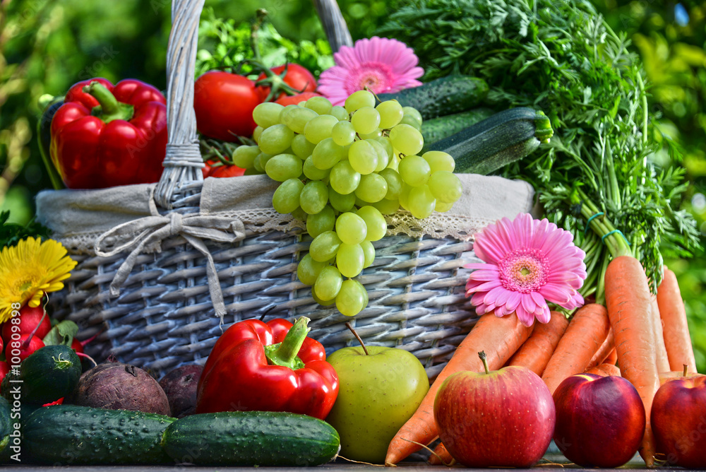 Variety of fresh organic vegetables and fruits in the garden Variety of fresh organic vegetables and fruits in the garden