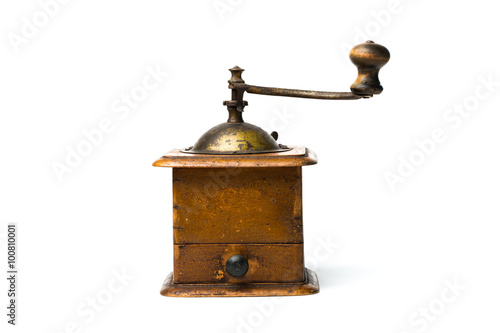 Antique hand-mill for a grinding spices and coffee isolated on