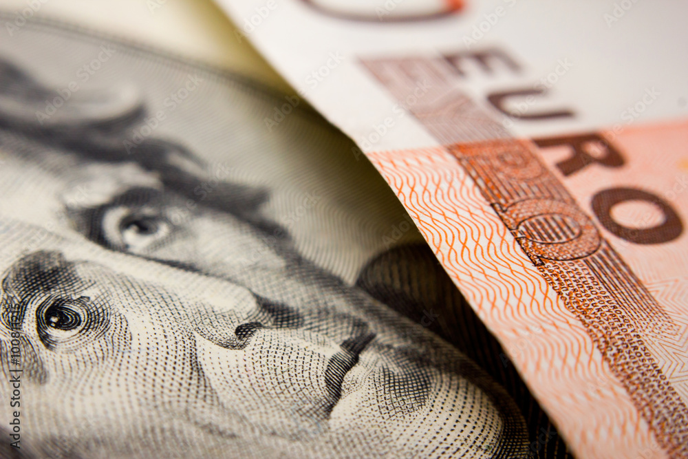Obraz premium Close-up of a 20-dollar note (figuring president Jackson) and a 50 euro banknote