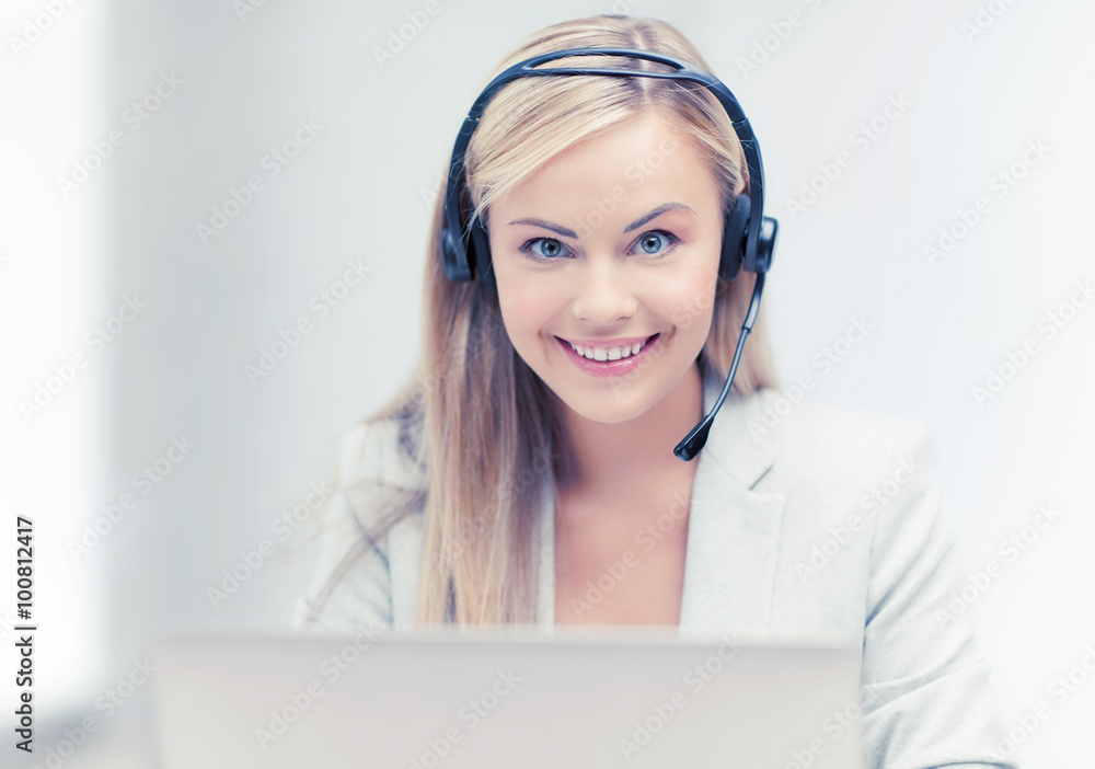 friendly female helpline operator with laptop friendly female helpline operator with laptop