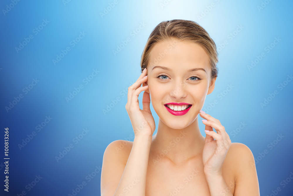 smiling young woman with pink lipstick on lips smiling young woman with pink lipstick on lips