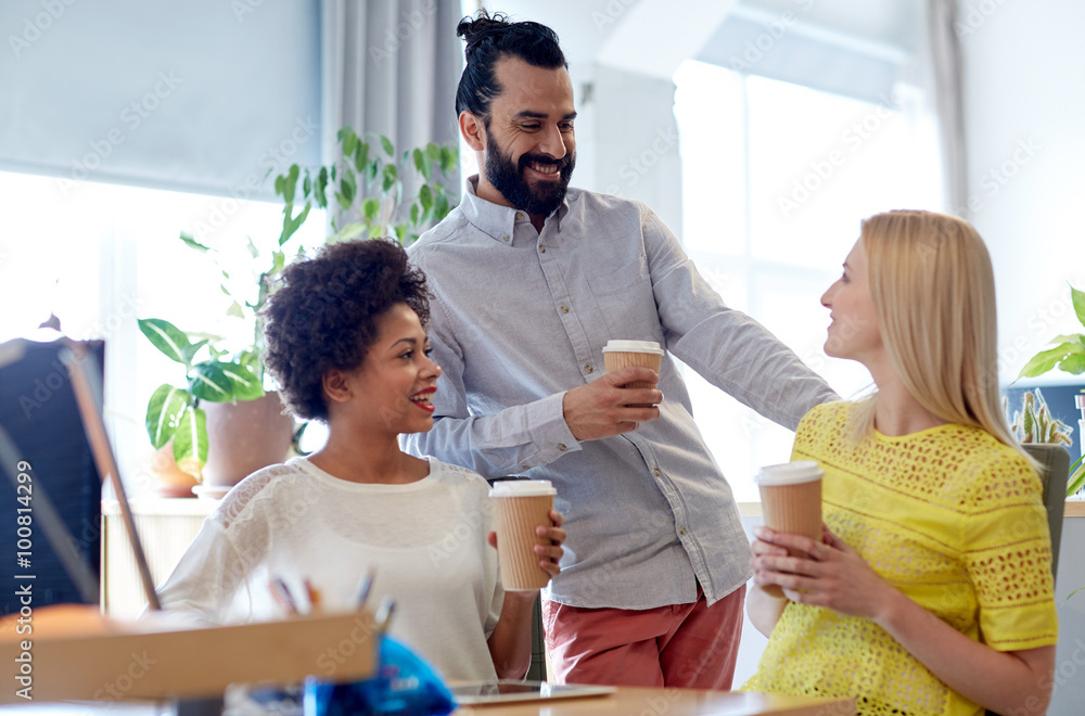 happy creative team drinking coffee in office happy creative team drinking coffee in office