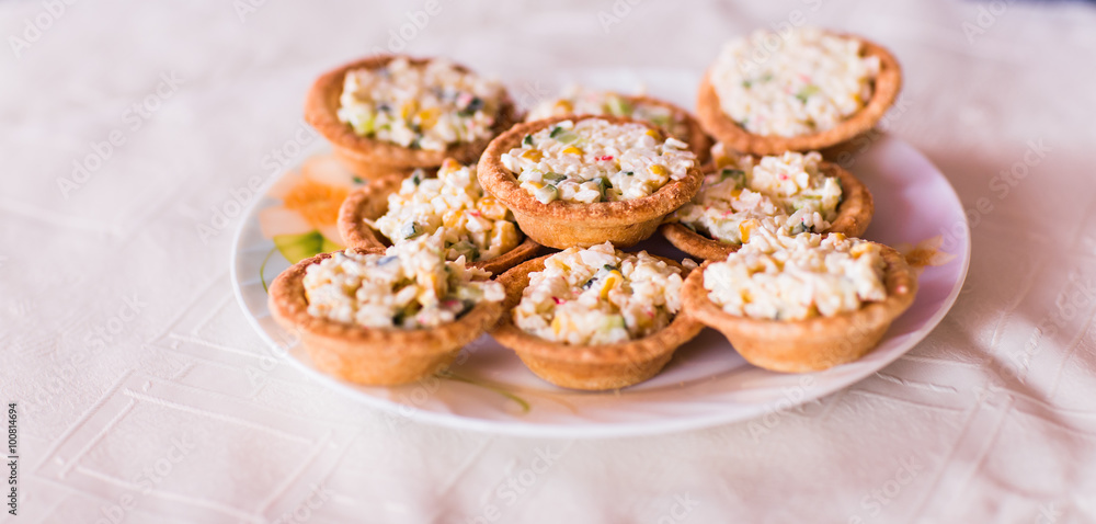 Holiday tartlets with salad of avocado