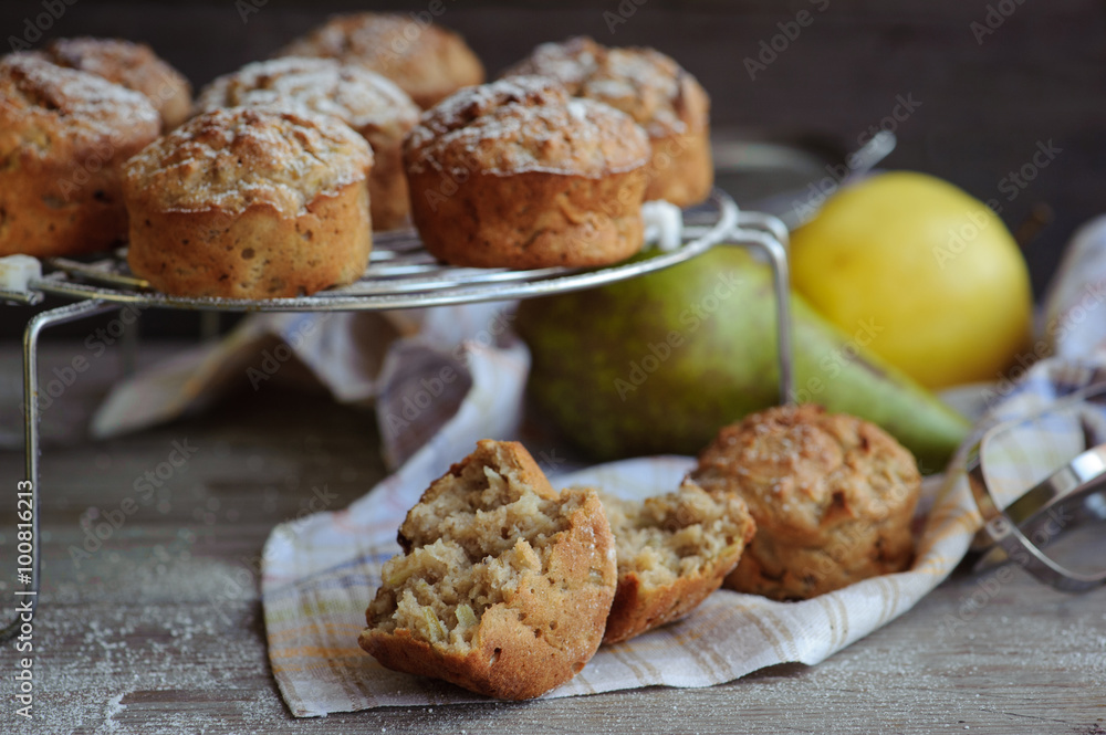 Freshly baked muffins with pear and apple