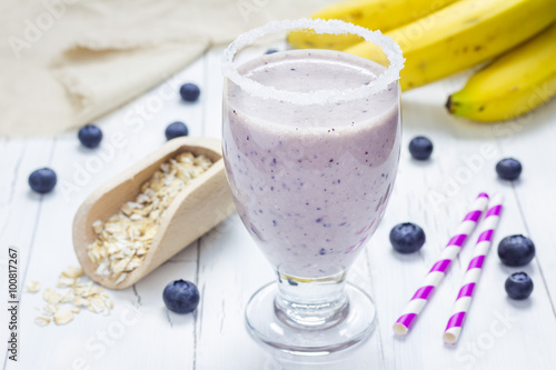 Fresh smoothie with blueberry, banana, oats, almond milk and yogurt