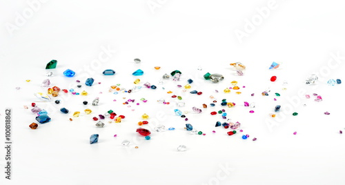 bright gems isolated on white background photo