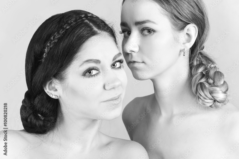 Fototapeta premium Portrait of two young women