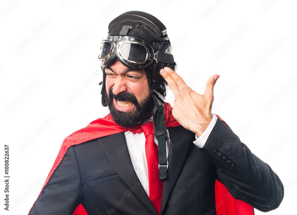 Super hero businessman making suicide gesture Super hero businessman making suicide gesture
