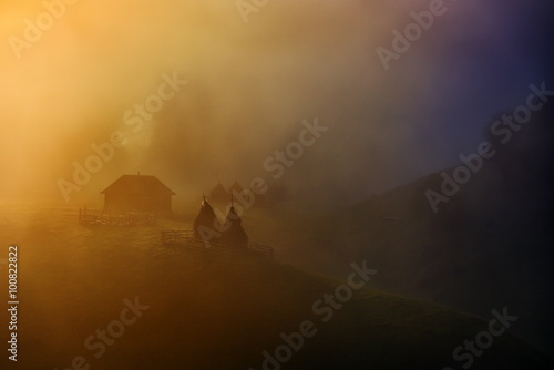 mountain landscape in autumn foggy  morning, Romania © bereta