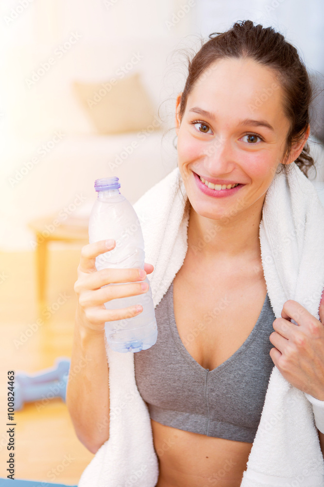 Attractive sportive woman eating after sport Attractive sportive woman eating after sport