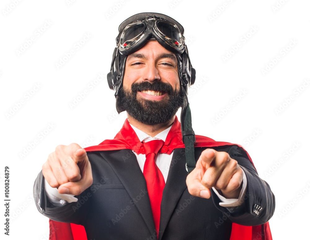 Super hero businessman pointing to the front Super hero businessman pointing to the front