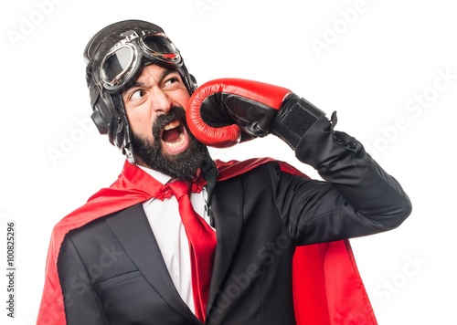 Super hero businessman with boxing gloves