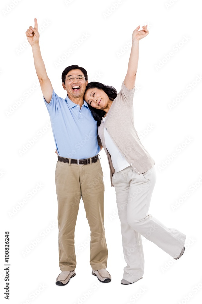Smiling couple holding each other Smiling couple holding each other
