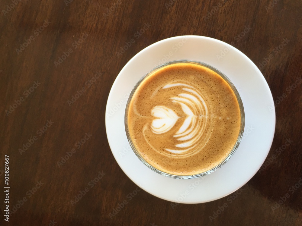A cup of coffee latte with heart pattern A cup of coffee latte with heart pattern