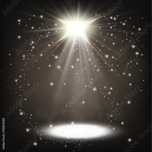 White spotlight shining with sprinkles floating