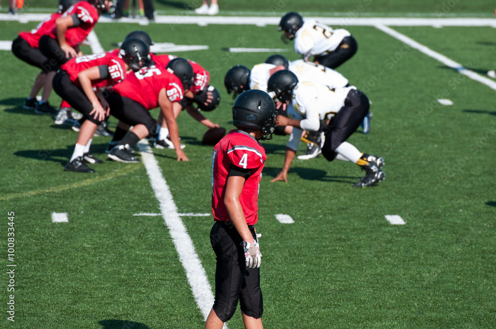 American high school football player getting ready to go out for American high school football player getting ready to go out for