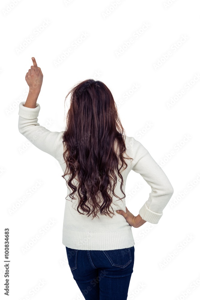 Rear view of brunette pointing up Rear view of brunette pointing up
