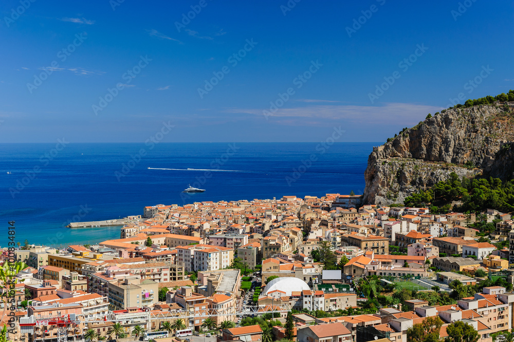Aerial view of Cefalu with the blue sea and skies, Sicily, Italy.