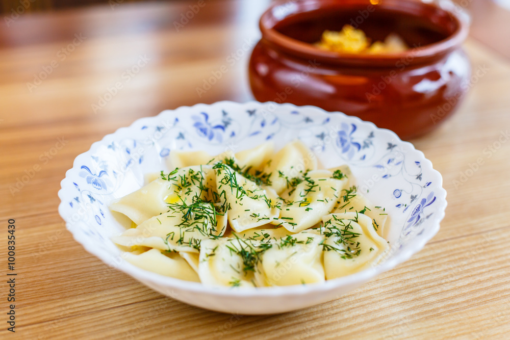 Russian traditional product - dumplings with meat. Russian traditional product - dumplings with meat.