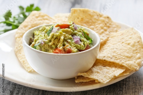 Guacamole and chips, selective focus