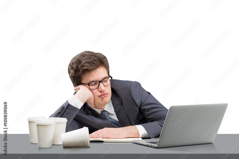 Young man sleeping at working place Young man sleeping at working place