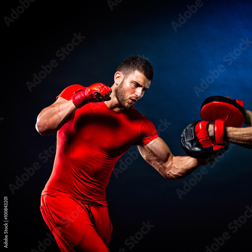 personal trainer man coach and man exercising boxing in the gym © bereta