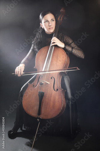 Woman playing cello player cellist