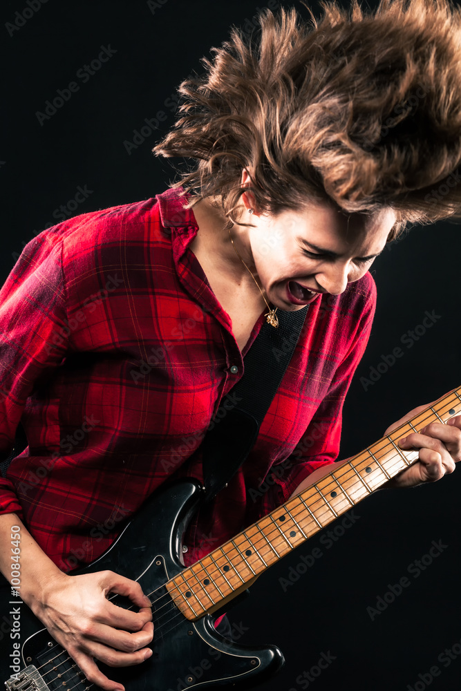 Obraz premium Model Red Flannel Shirt Electric Guitar Hair Flip