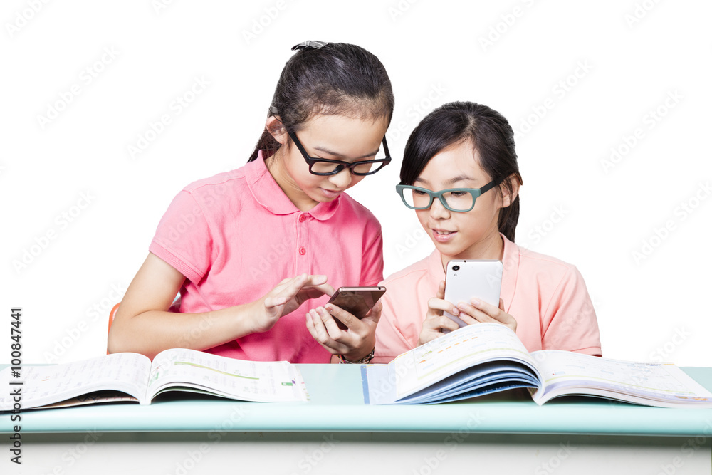 Girl students using mobile phone Girl students using mobile phone