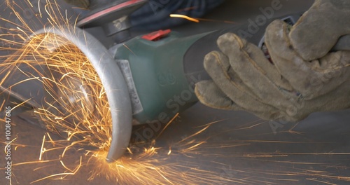 Abrasive Cutting With Angle Grinder,Machine, Hand-Held Power Tool,Grinding Wheel photo