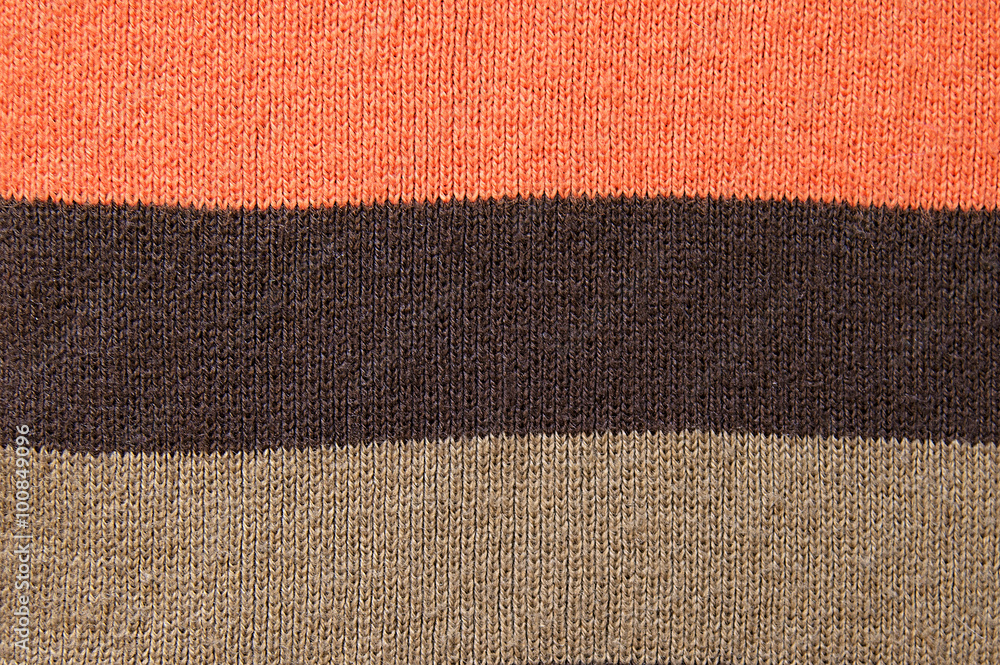 Fototapeta premium Striped woolen scarf background texture