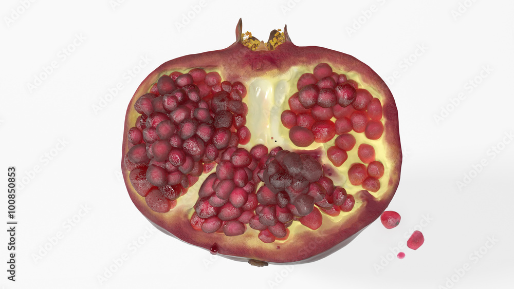 Pomegranate sliced in half, fruit isolated on white background Pomegranate sliced in half, fruit isolated on white background